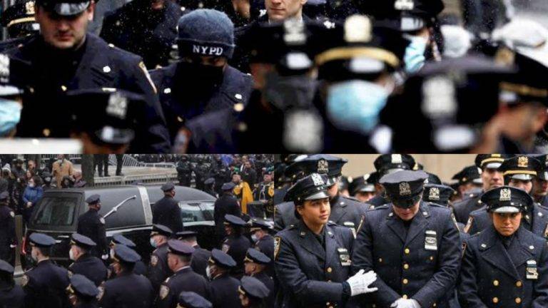 Policias de NY toman la 5ta Avenida para despedir a un colega asesinado